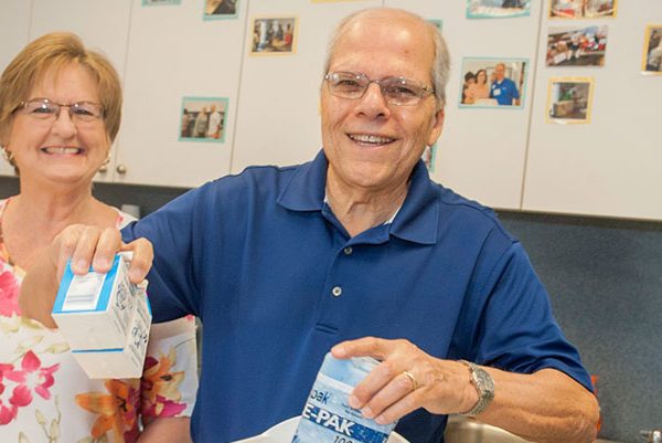 Volunteers helping to deliver meals on wheels. Volunteers helping to deliver meals on wheels.